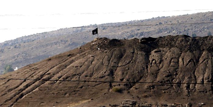 Kurds fight against militants over Kobani